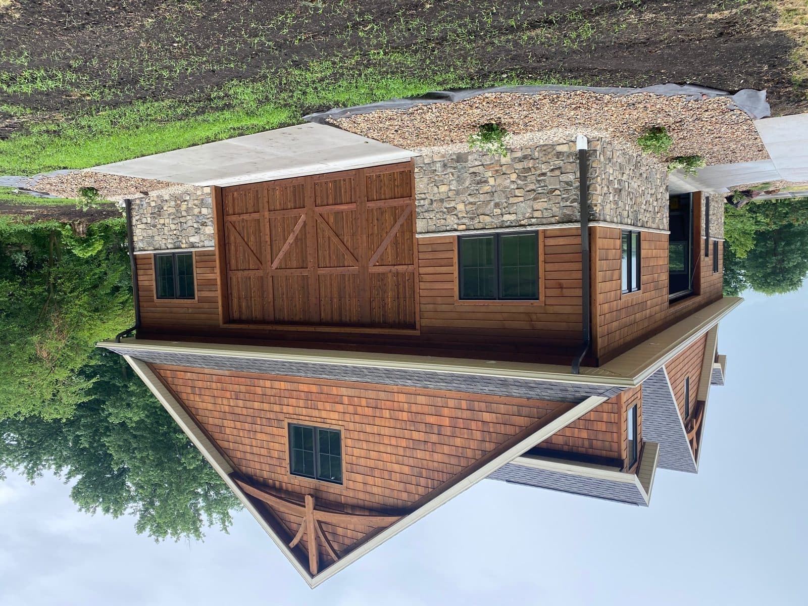 Custom Craft Doors USA wood garage door on a customer's home