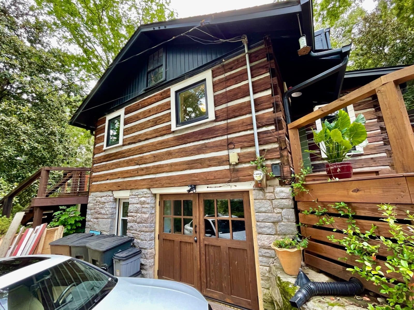 Real-wood carriage-style garage door installed on a customer home